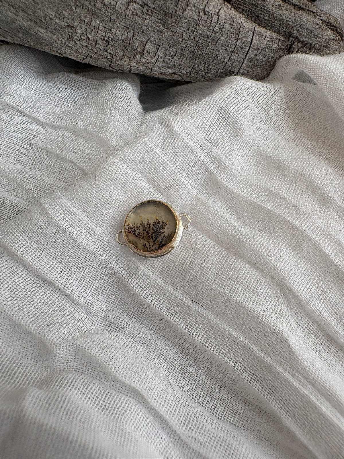 headwaters. a mixed metal permanent jewelry connector with sterling silver and 14k gold filled or custom bracelet. dendritic scenic agate.