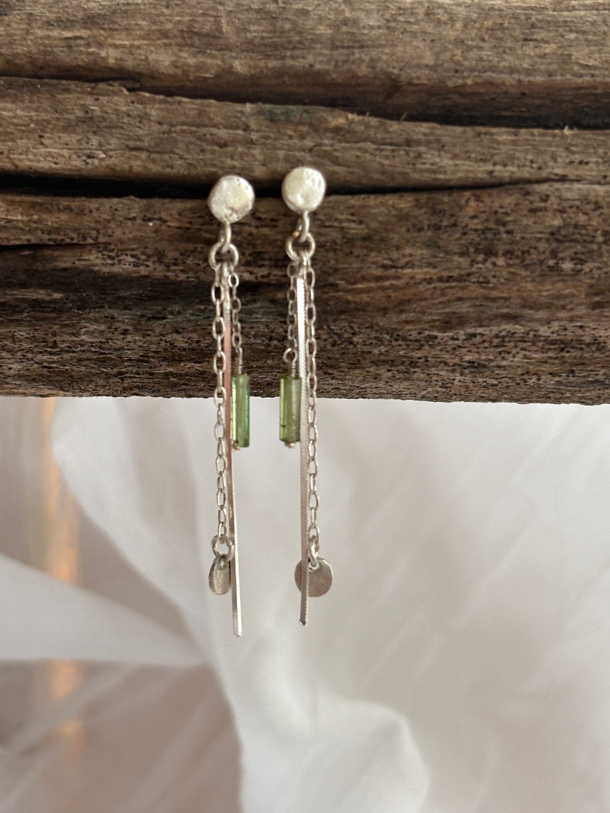 cascade. rustic sterling silver stud earrings with green tourmaline crystals and long linear sterling chain accents.